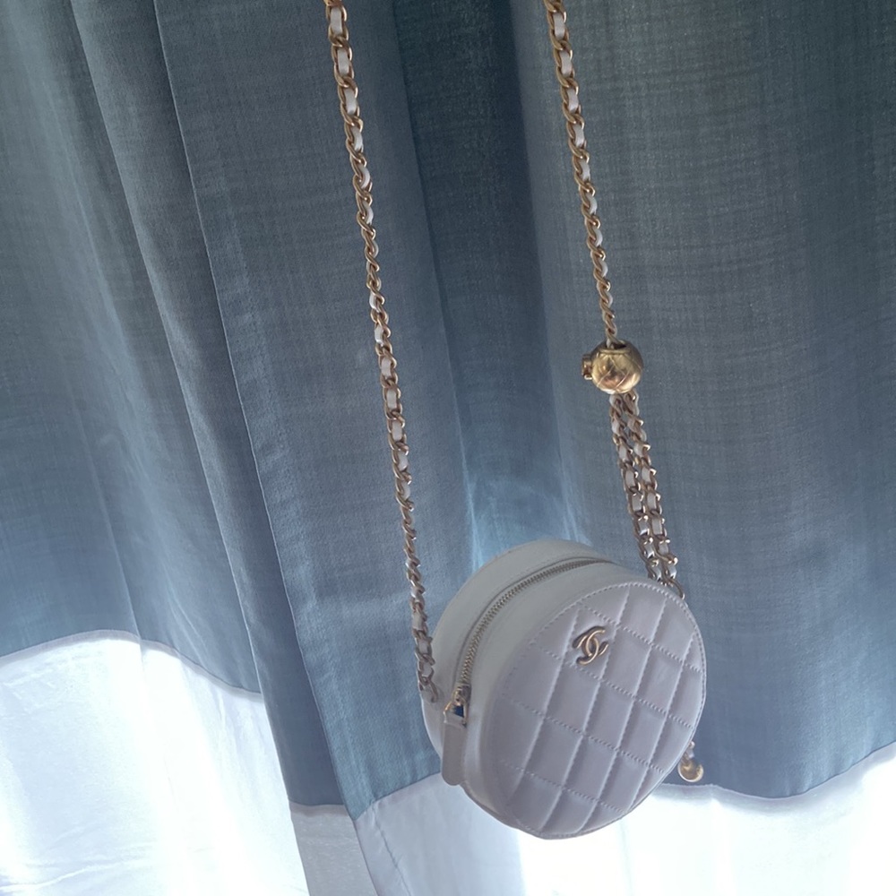 Chanel small round clutch bag- adjustable strap